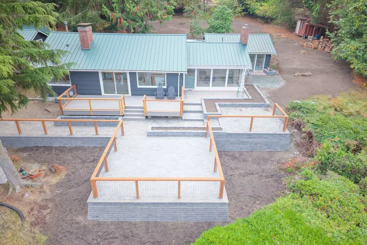 Aerial view of a home site laid out and under construction